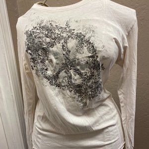 White long sleeve shirt with designs